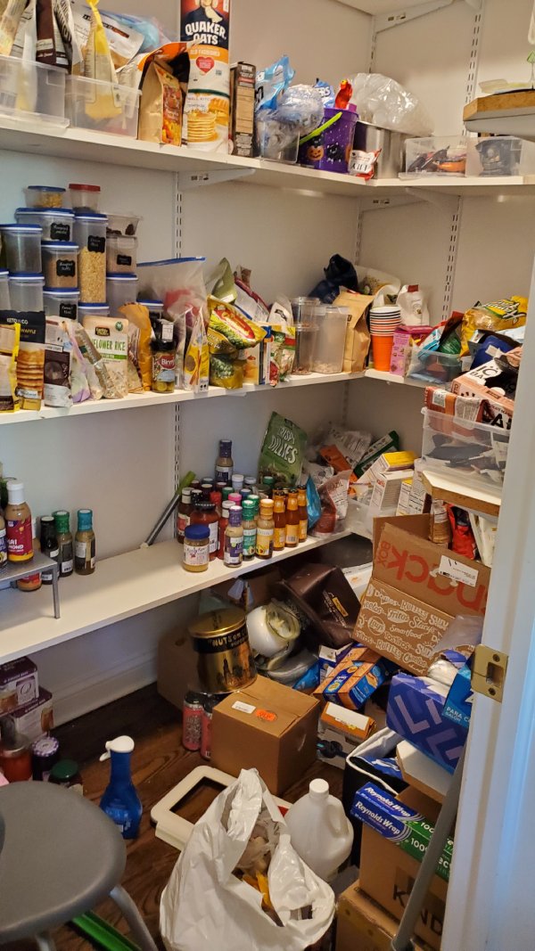 Before: pantry shelves with crowded food containers and bags on the floor